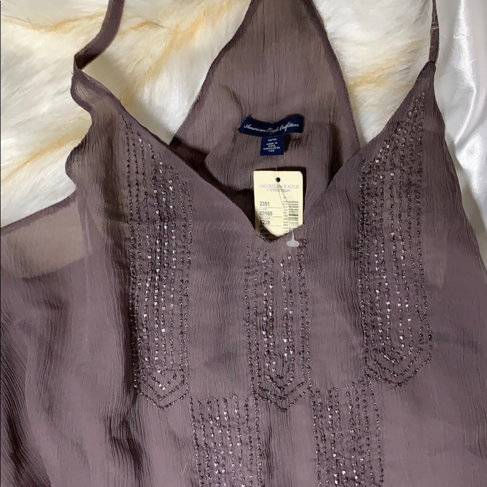 American Eagle tank top blouse with accents.